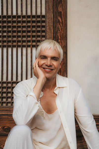 Sammy Voigt founder of Soul KBeauty shop portrait smiling in a temple in Seoul